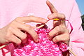 Pink knitting in front of pink sweatshirt.JPG